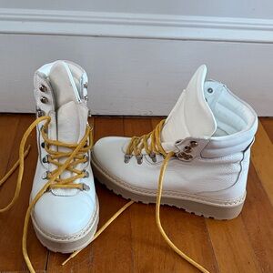 White Leather Women's Boots with Yellow Laces and fur lining.